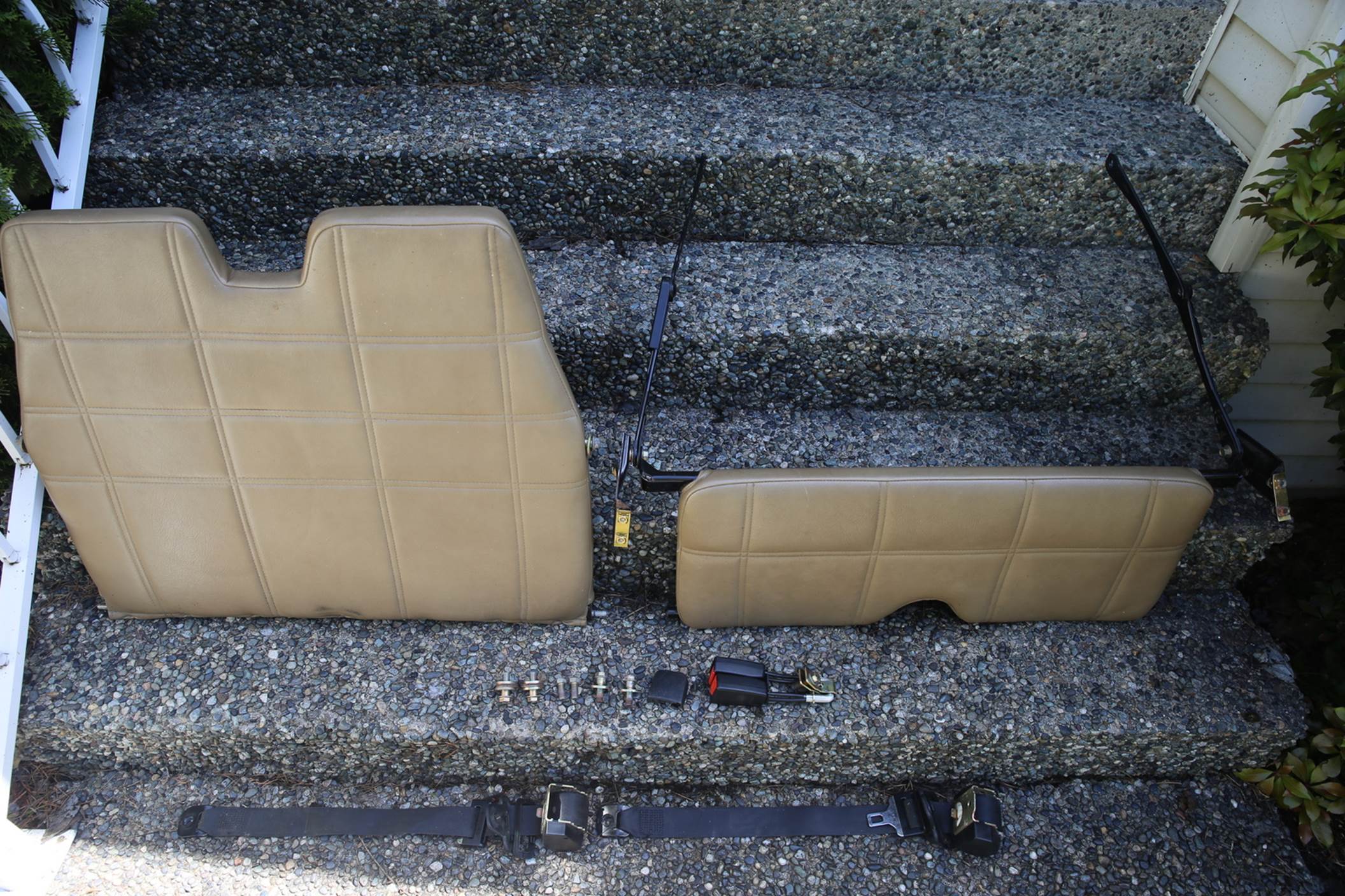 A picture containing ground, suitcase, outdoor, stone

Description automatically generated